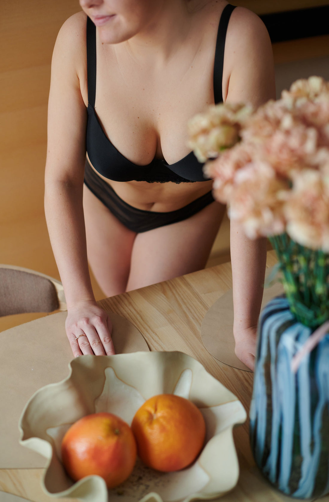 woman wearing Symmetrista's asymmetrical breast bra and matching pants