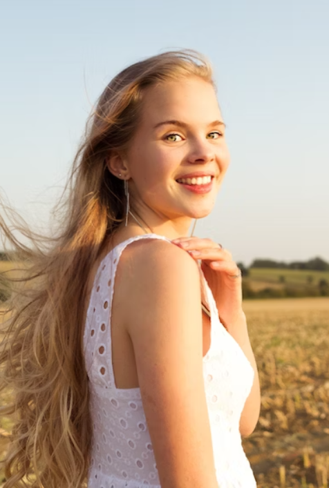 Teenage girl smiling at camera