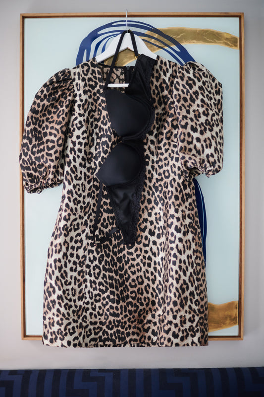 Bra hung along with a leopard skin dress